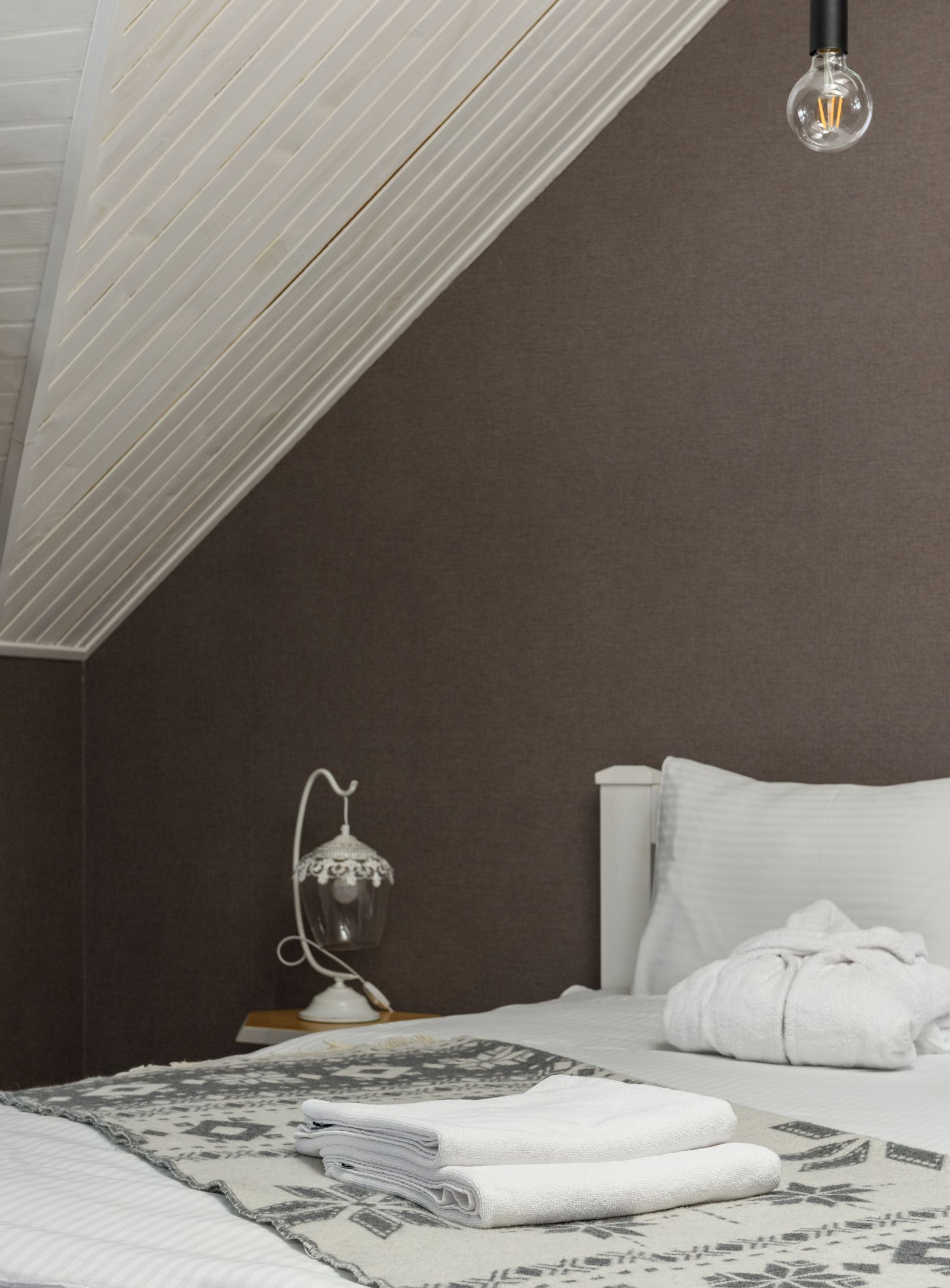 Neatly arranged guest bed ready for an overnight stay