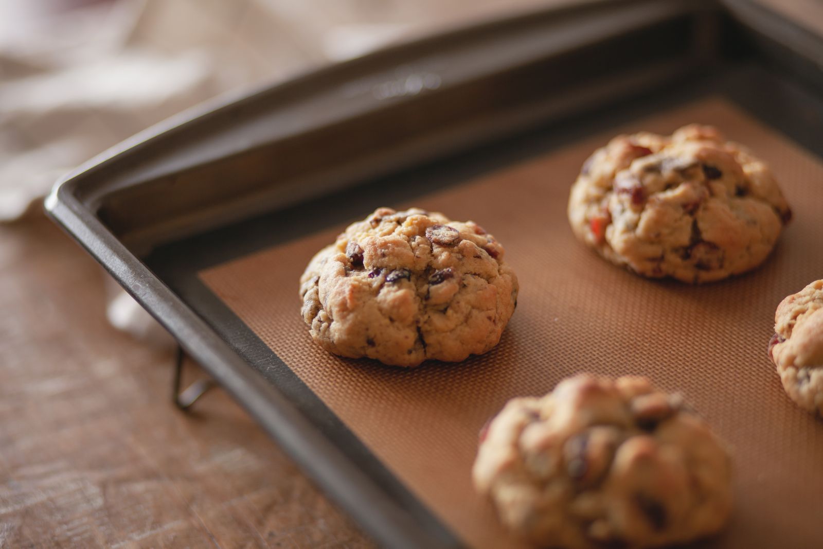 Cookies spaced on a rectangular baking sheet