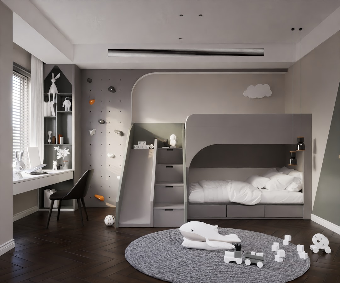 Toys on a defined floor area near a bunk bed in a children’s room