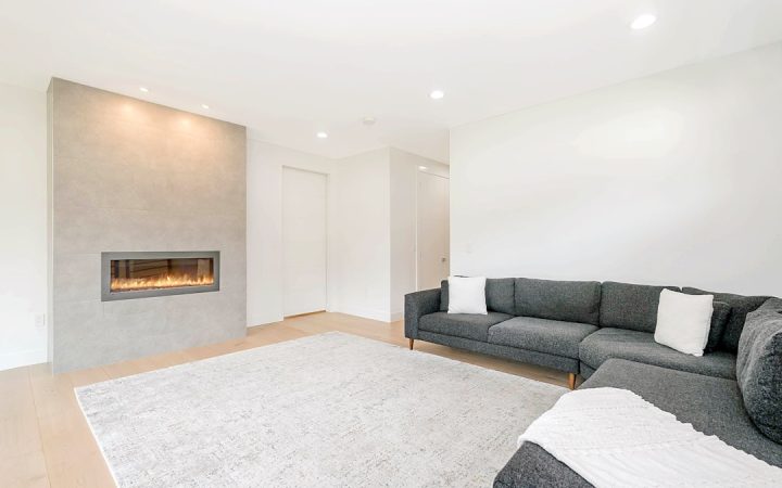 Large rug covering the main traffic and seating area of a family room