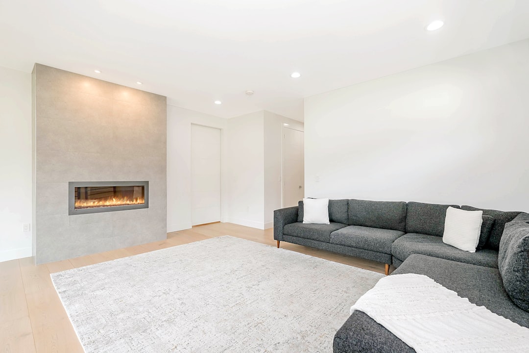 Large rug covering the main traffic and seating area of a family room