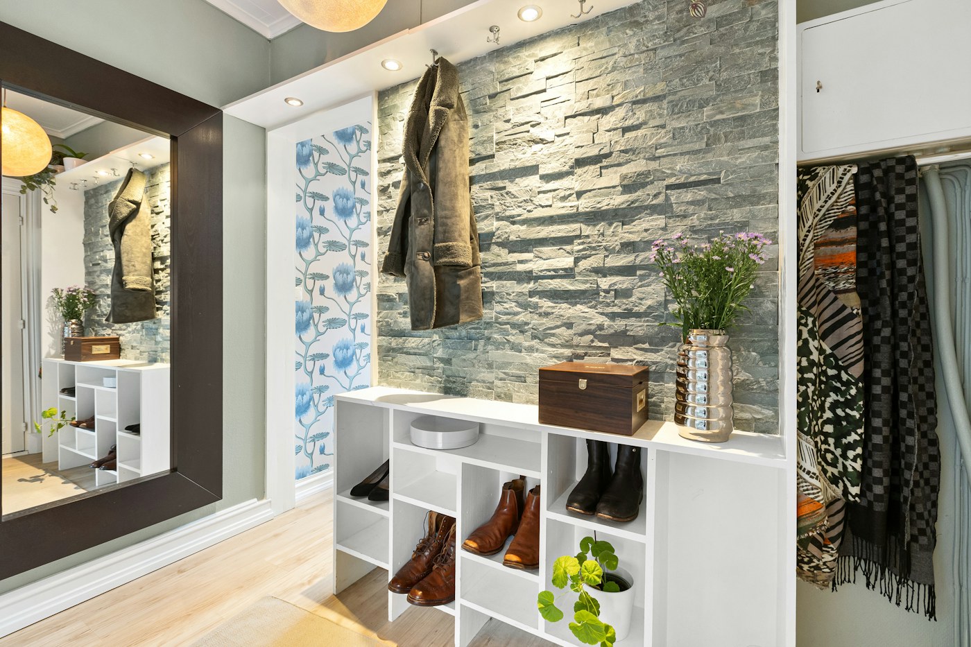 Shoes stored on a defined shelf instead of spreading across the floor