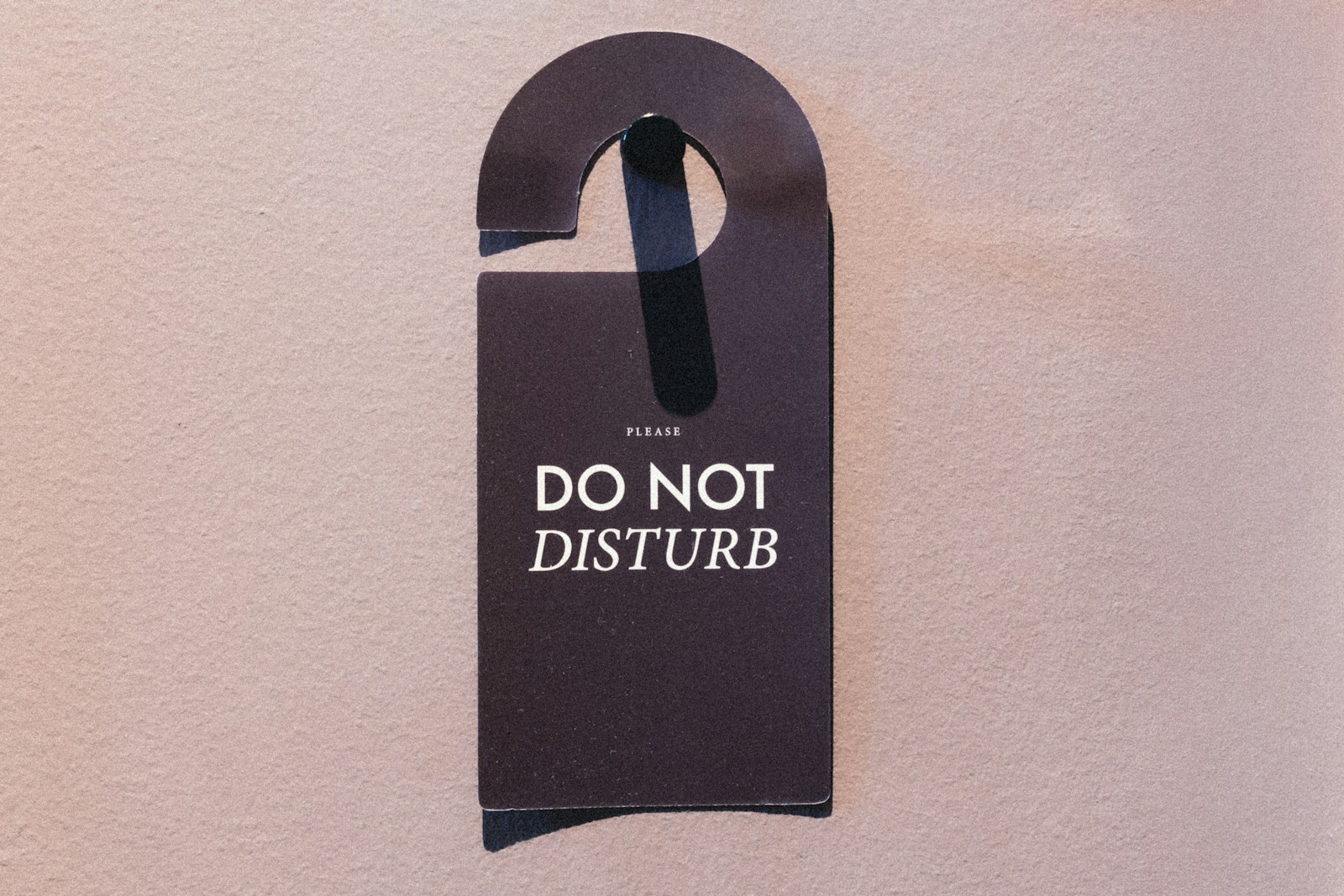 Do not disturb sign hanging on a door
