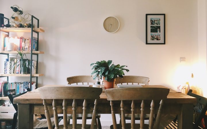 Small dining table in an apartment showing limited but usable shared surface space