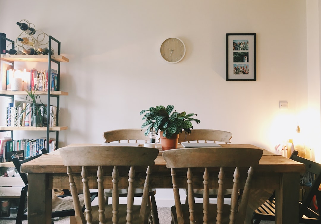 Small dining table in an apartment showing limited but usable shared surface space