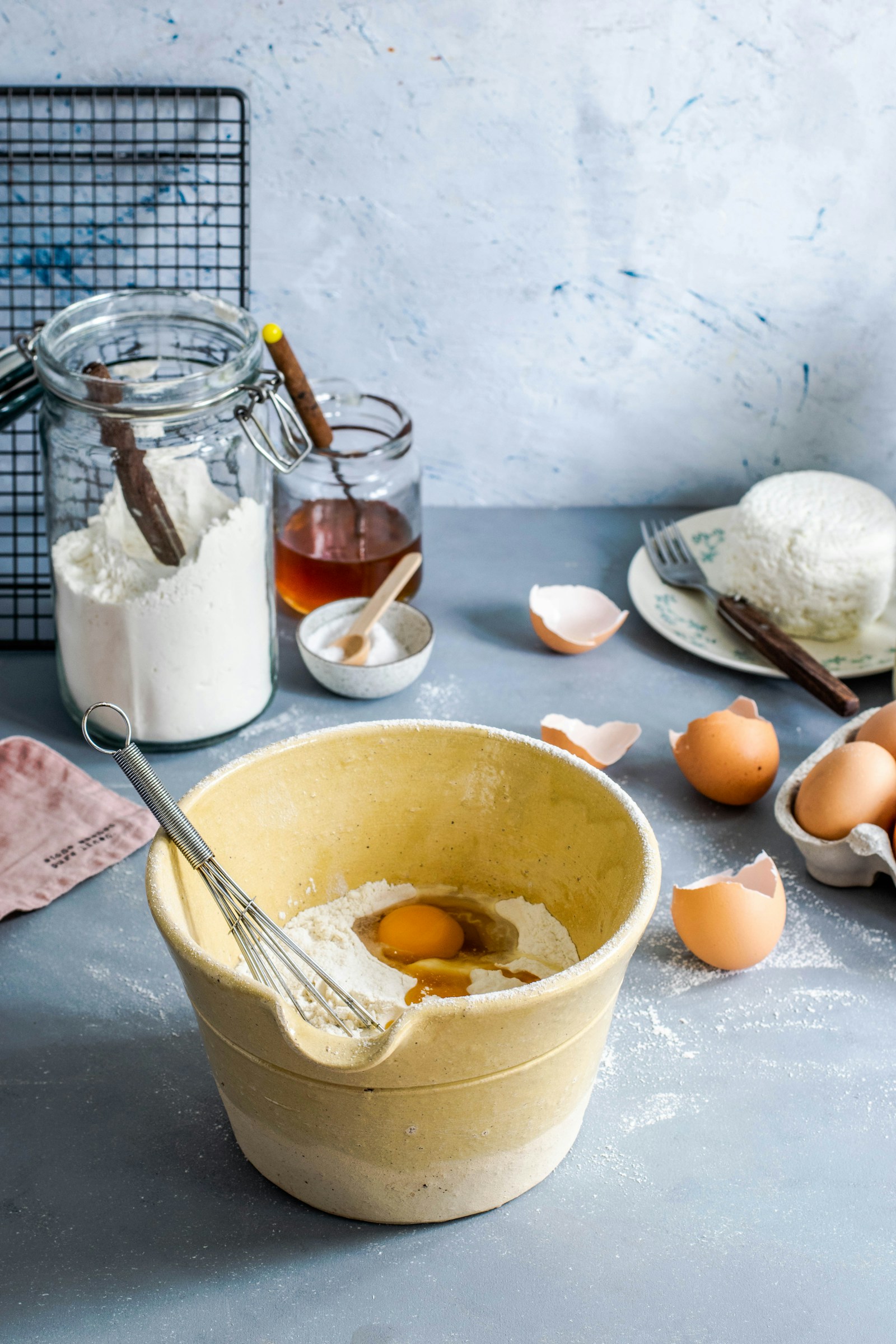 Mixing bowl, whisk, eggs and flour