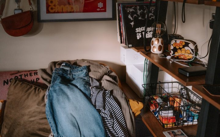 Travel clothing laid out for sorting and return to normal storage