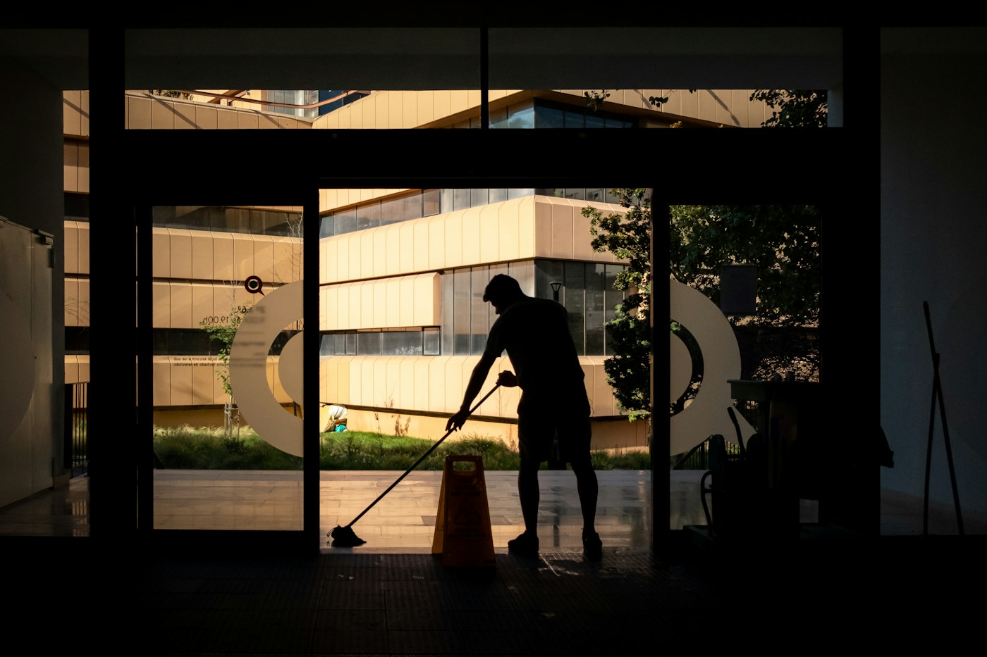 Cleaning equipment stored vertically to reduce floor-space use