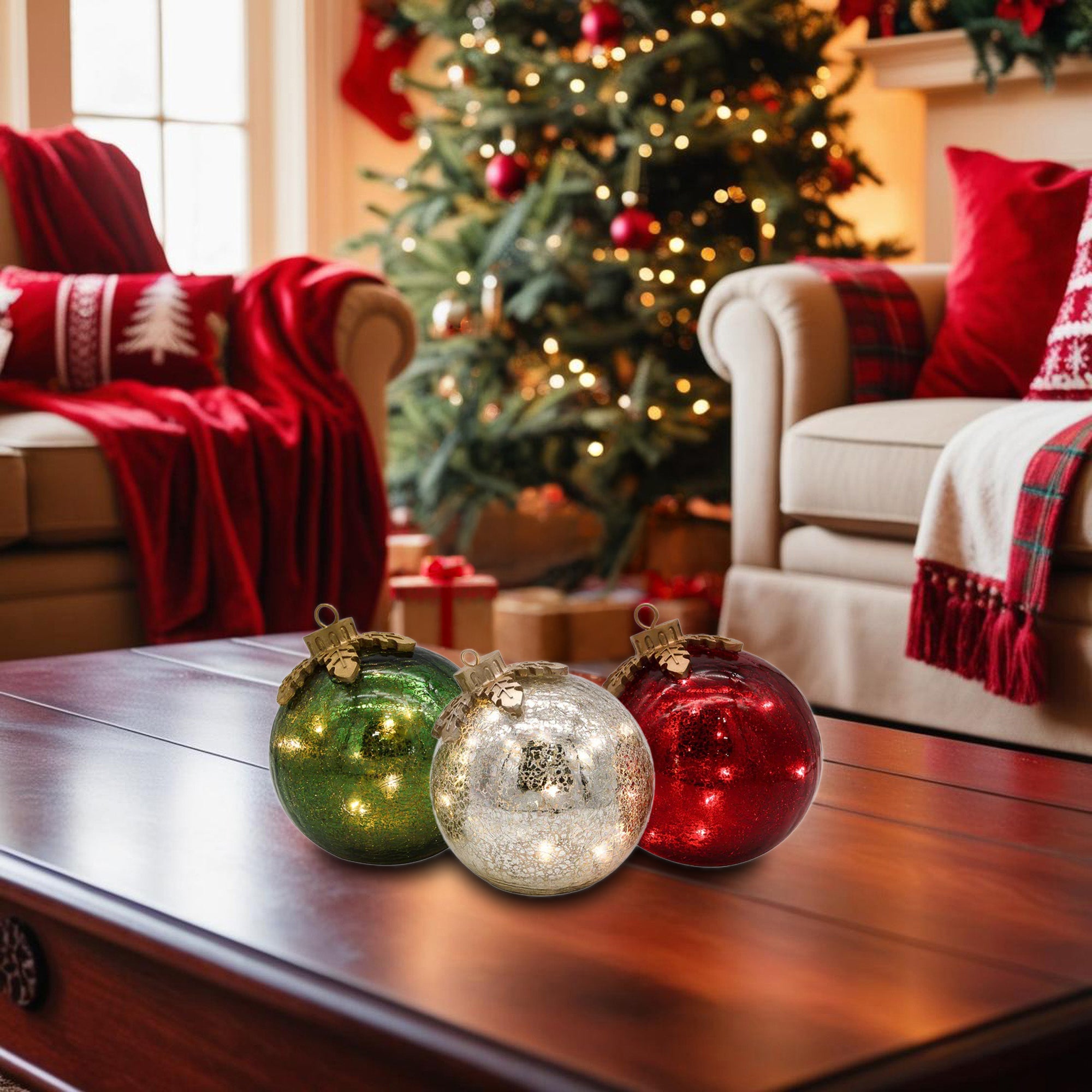 Three LumaBase glass ornament lights grouped on a living-room coffee table