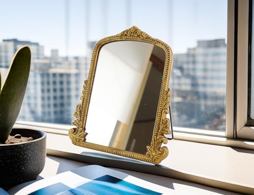 HSDDHOME tabletop mirror styled beside a window and separate potted plant
