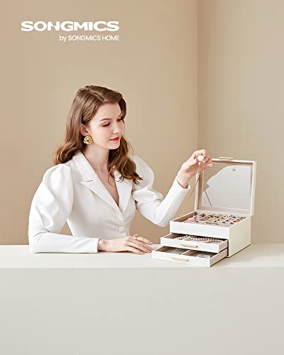 SONGMICS white-and-gold jewelry box shown being used on a dressing table