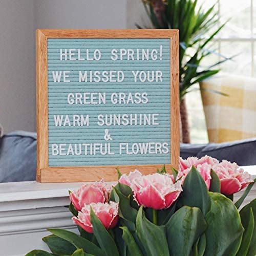 Seafoam letter board with a spring sample message