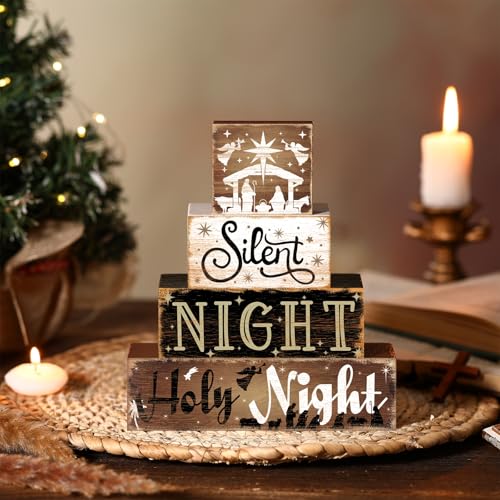 Stacked nativity blocks on a round mat in a Christmas supplier scene