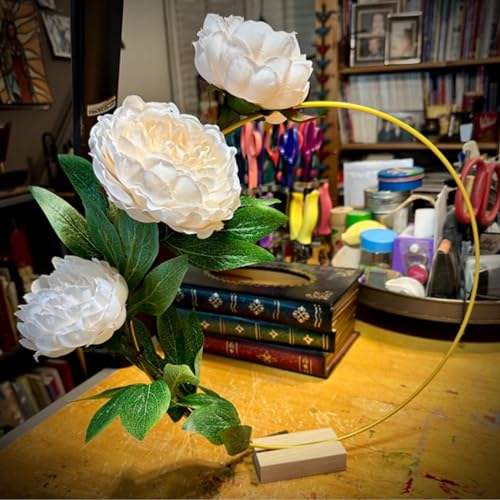 White floral hoop styled on a worktable