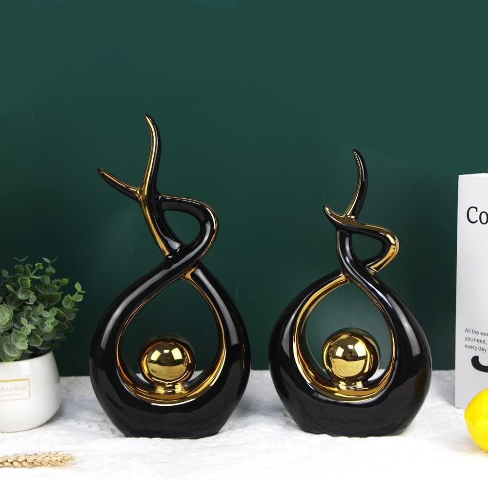 Norrclp sculpture beside separate desktop styling objects