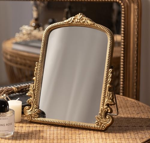 HSDDHOME ornate gold mirror styled on a dry woven surface with separate cosmetics