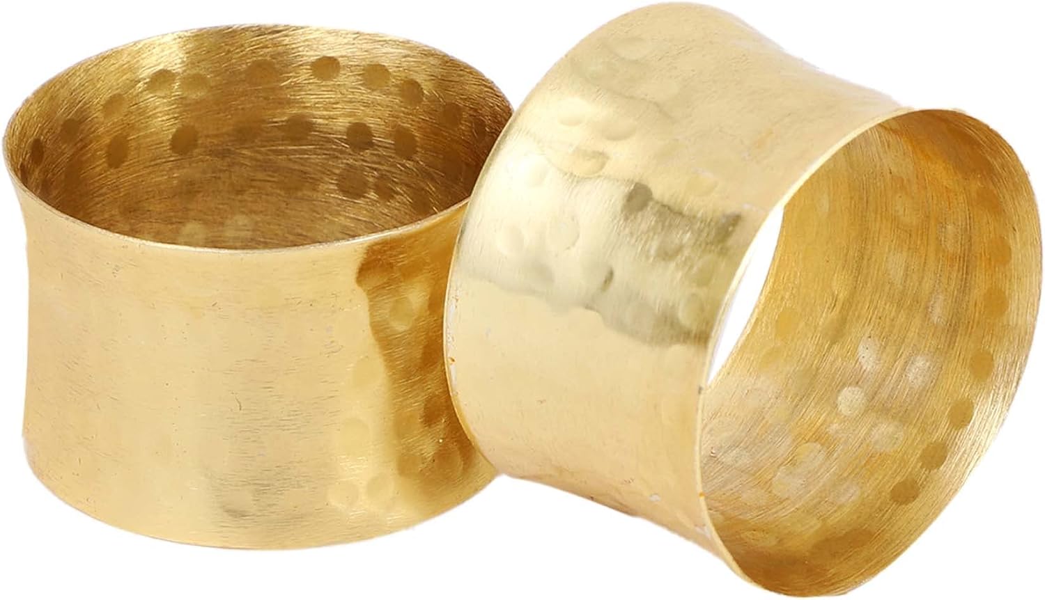 Angled close-up of two hammered gold rings