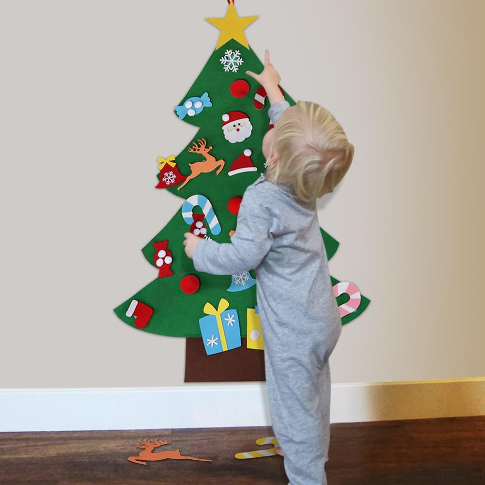 Supplier scene of a child rearranging felt ornaments