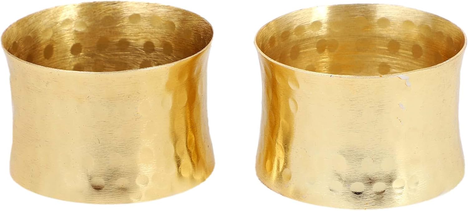 Two metal rings showing their hammered surfaces