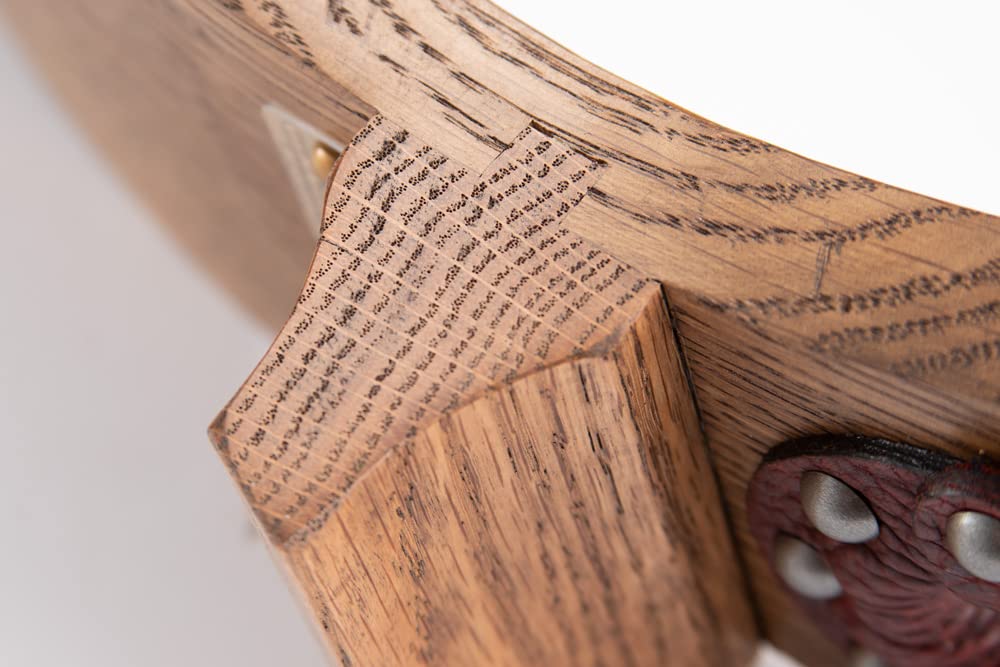 Close view of grain and shaped wood near the boot jack yoke