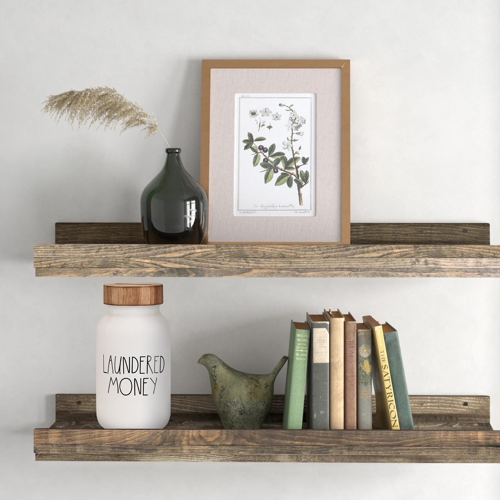 Coin jar styled on shelves with separate books and other decor