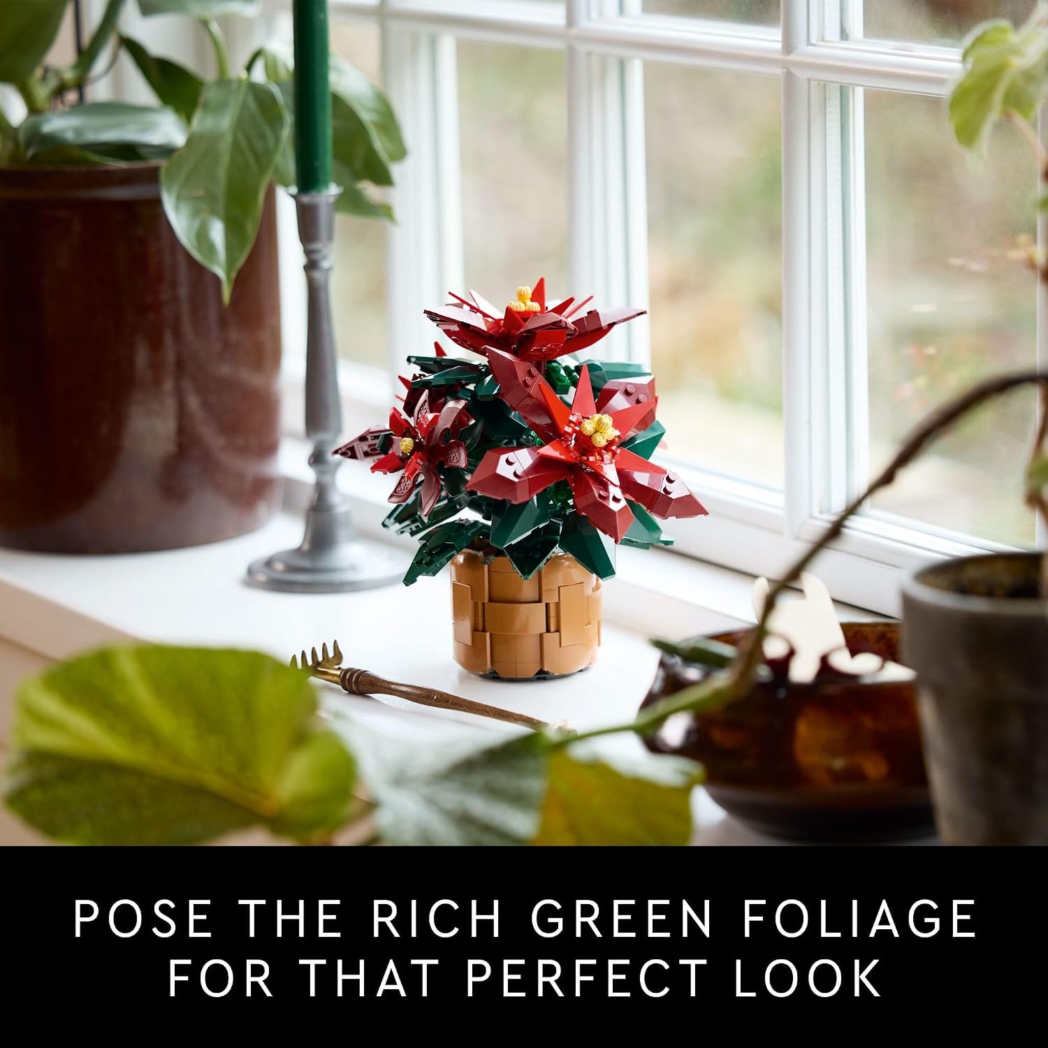 LEGO poinsettia foliage in a supplier window display