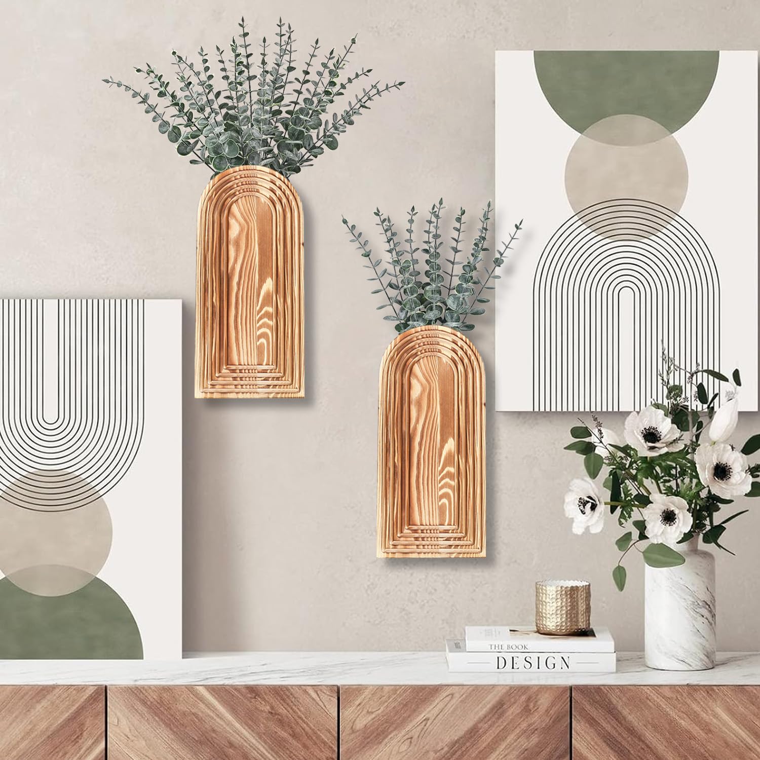 Paired brown arched wall pockets shown with framed geometric artwork