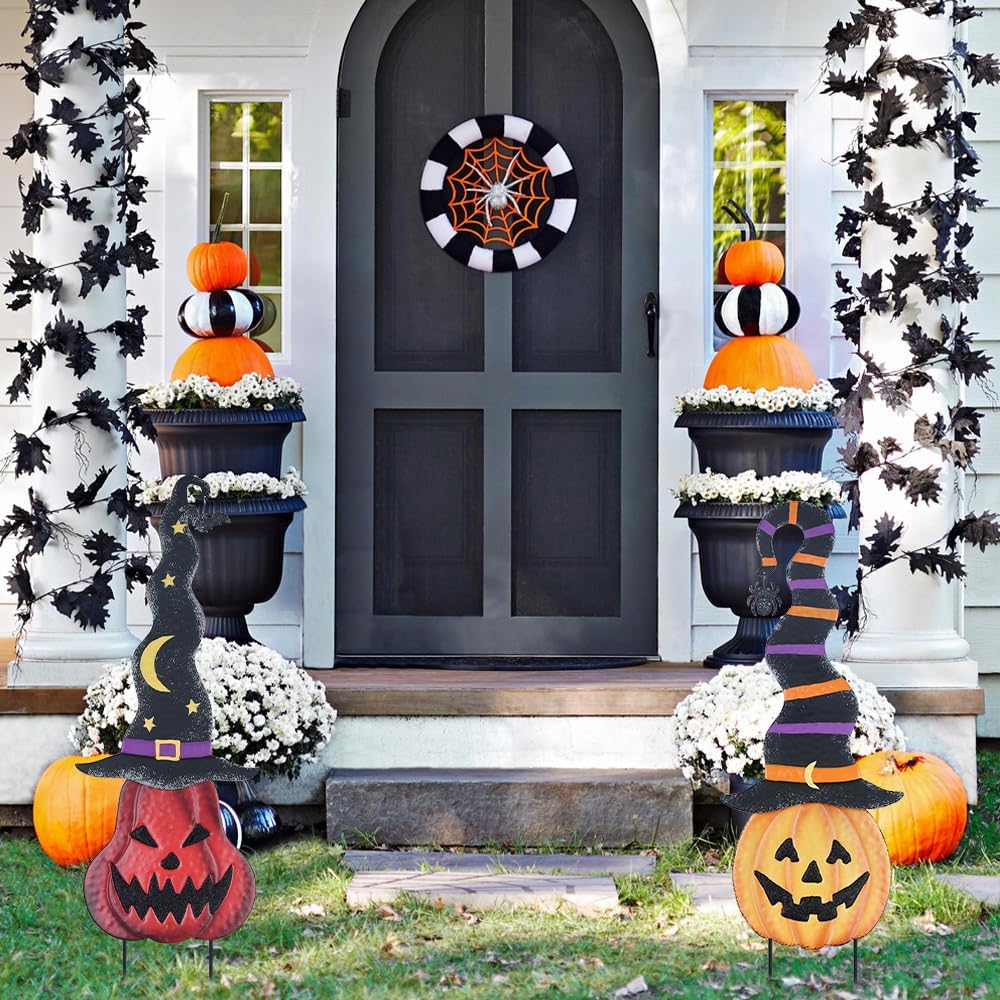 Manufacturer pumpkin-stake display beside a front door