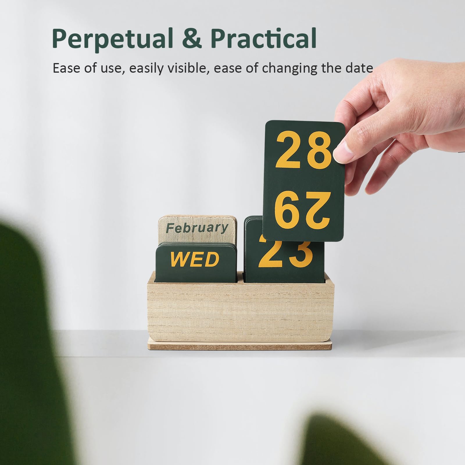 Hand changing a numbered DEERINE date board in supplier photograph