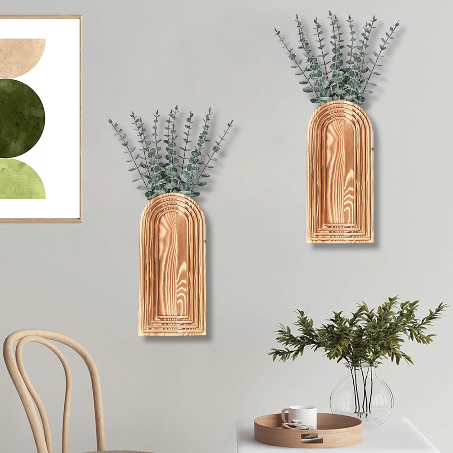 Two brown wall pockets arranged at different heights above a chair