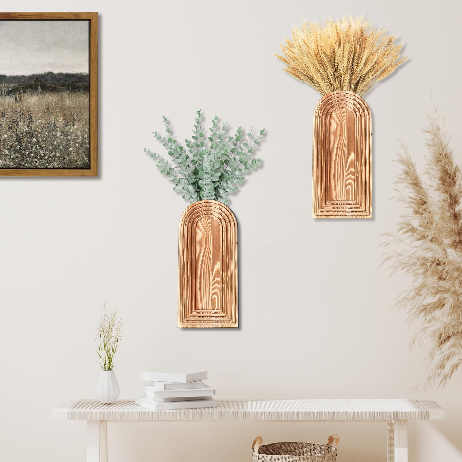 Brown arched wall pockets styled with dry stems above a console