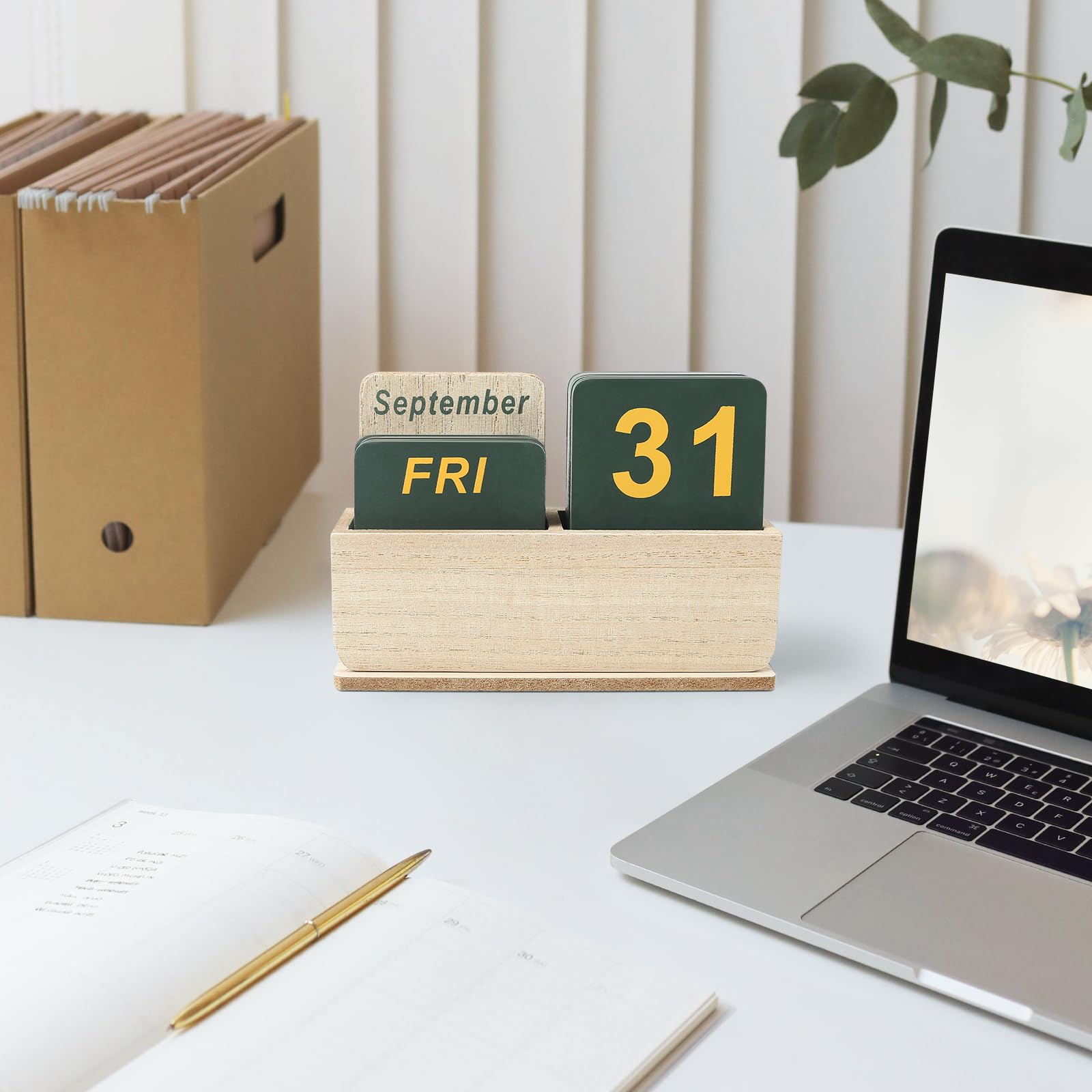 DEERINE calendar beside a laptop in a supplier scene displaying an incorrect September 31 date