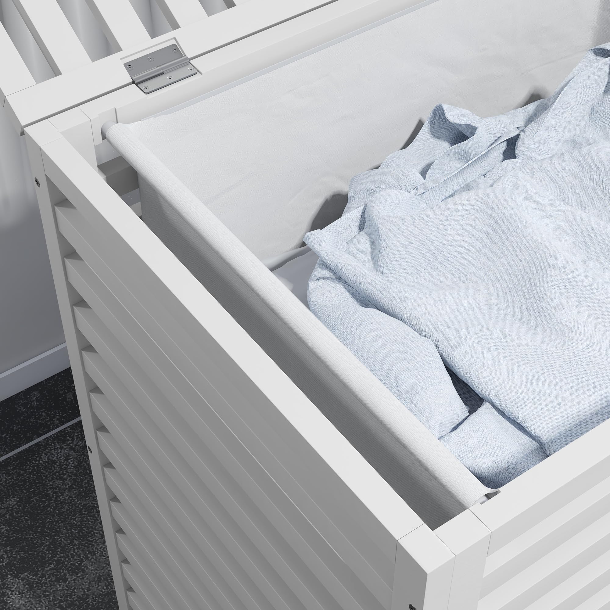 Open hamper showing the attached inner laundry bag
