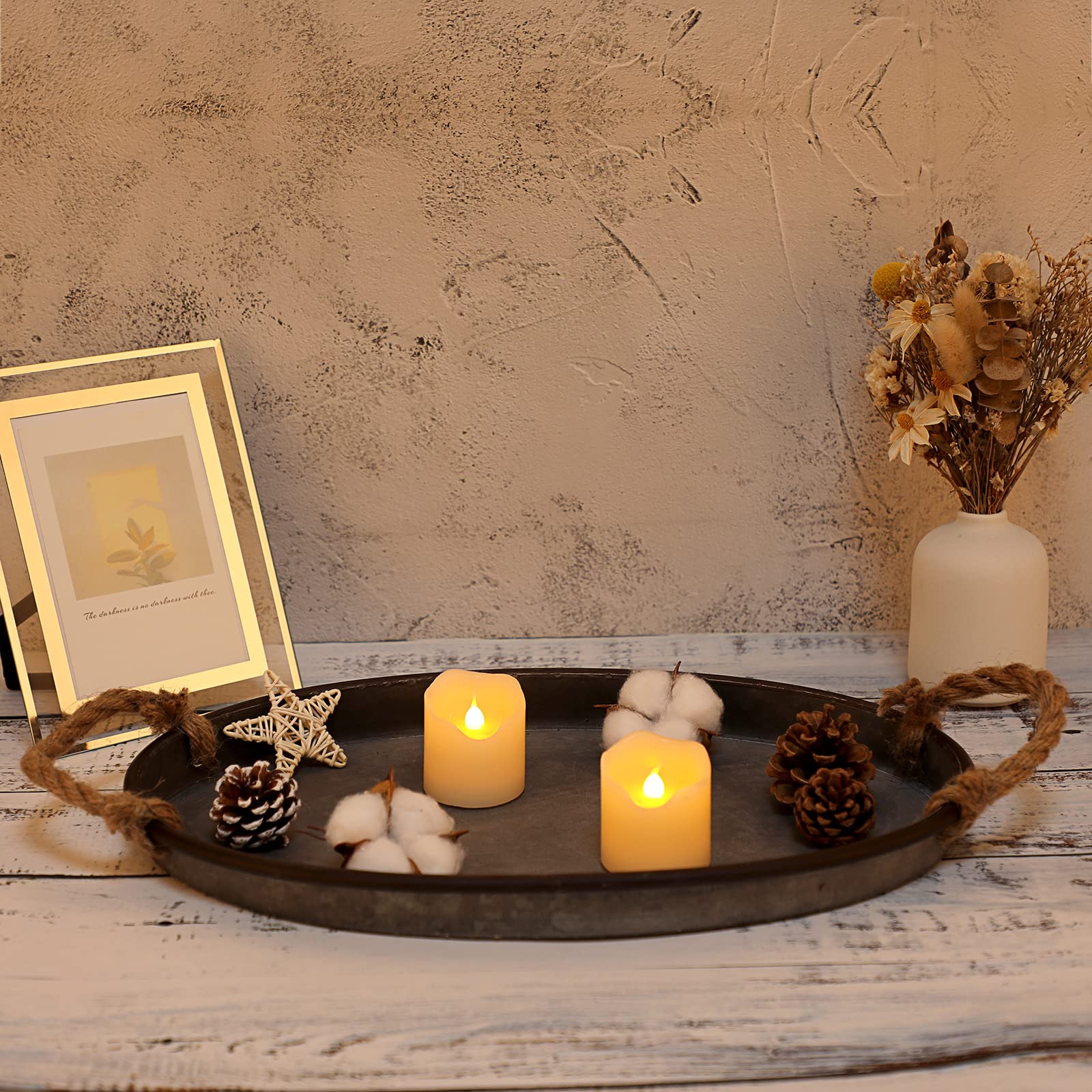 Rustic oval tray styled with separate flameless-style lights and pine cones