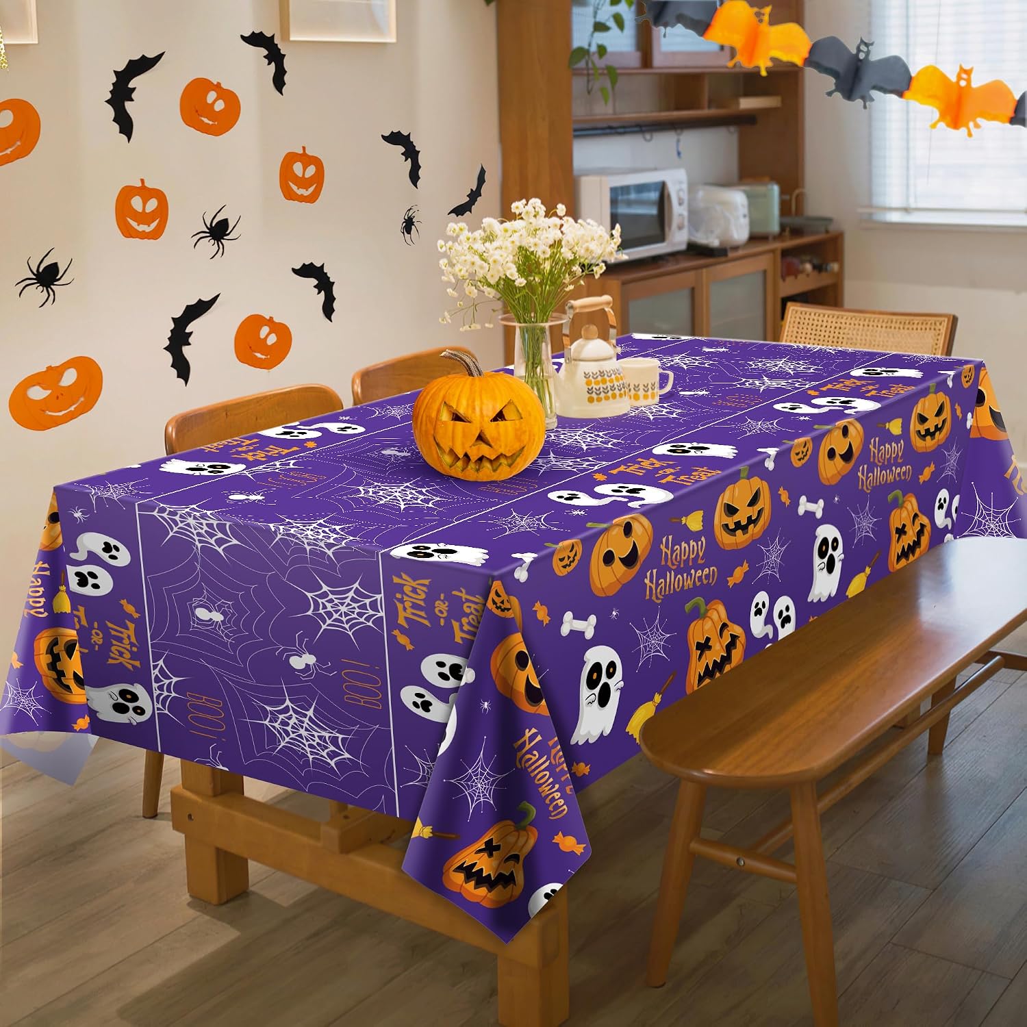 Purple Halloween cloth on a styled dining table
