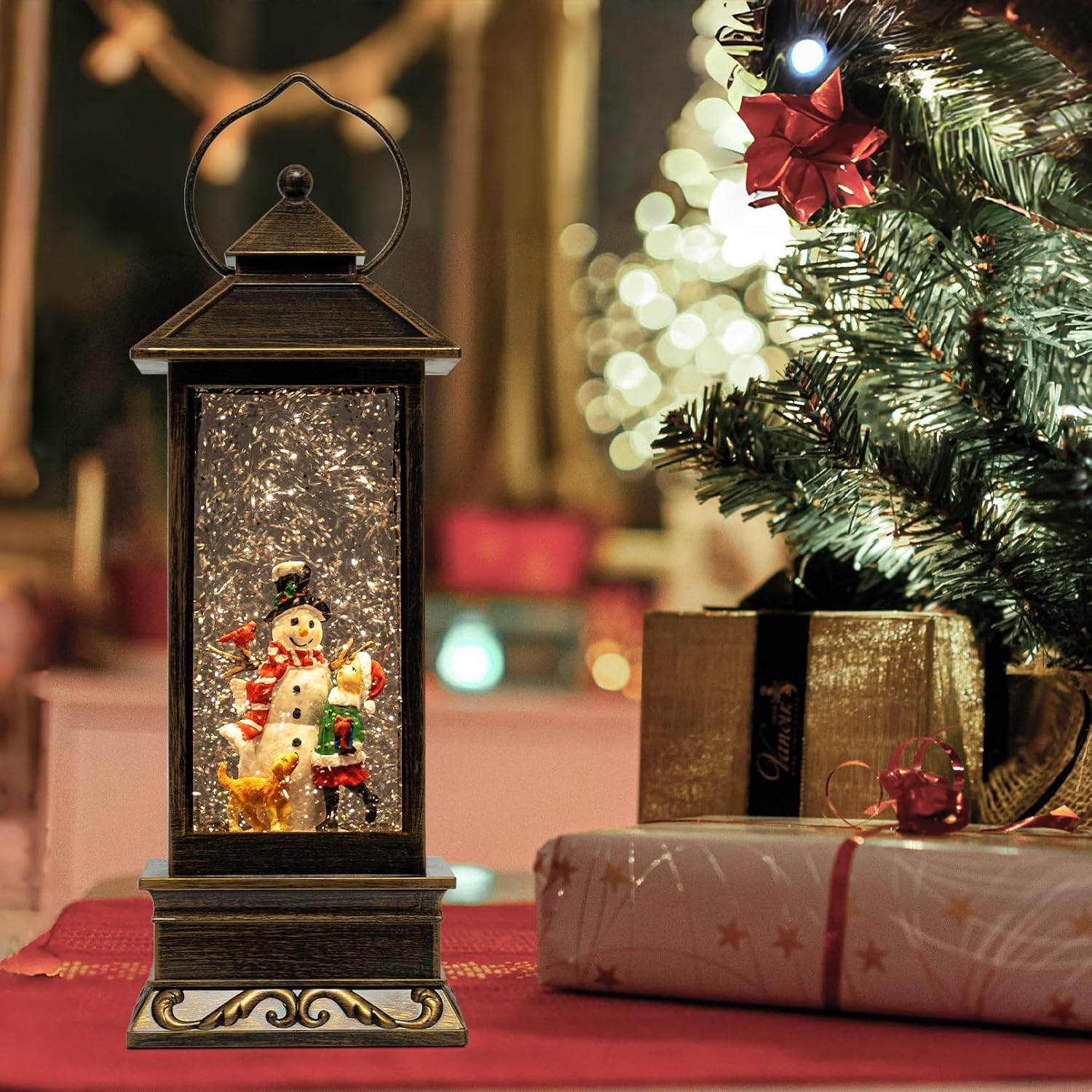 Glitter lantern beside a decorated Christmas tree