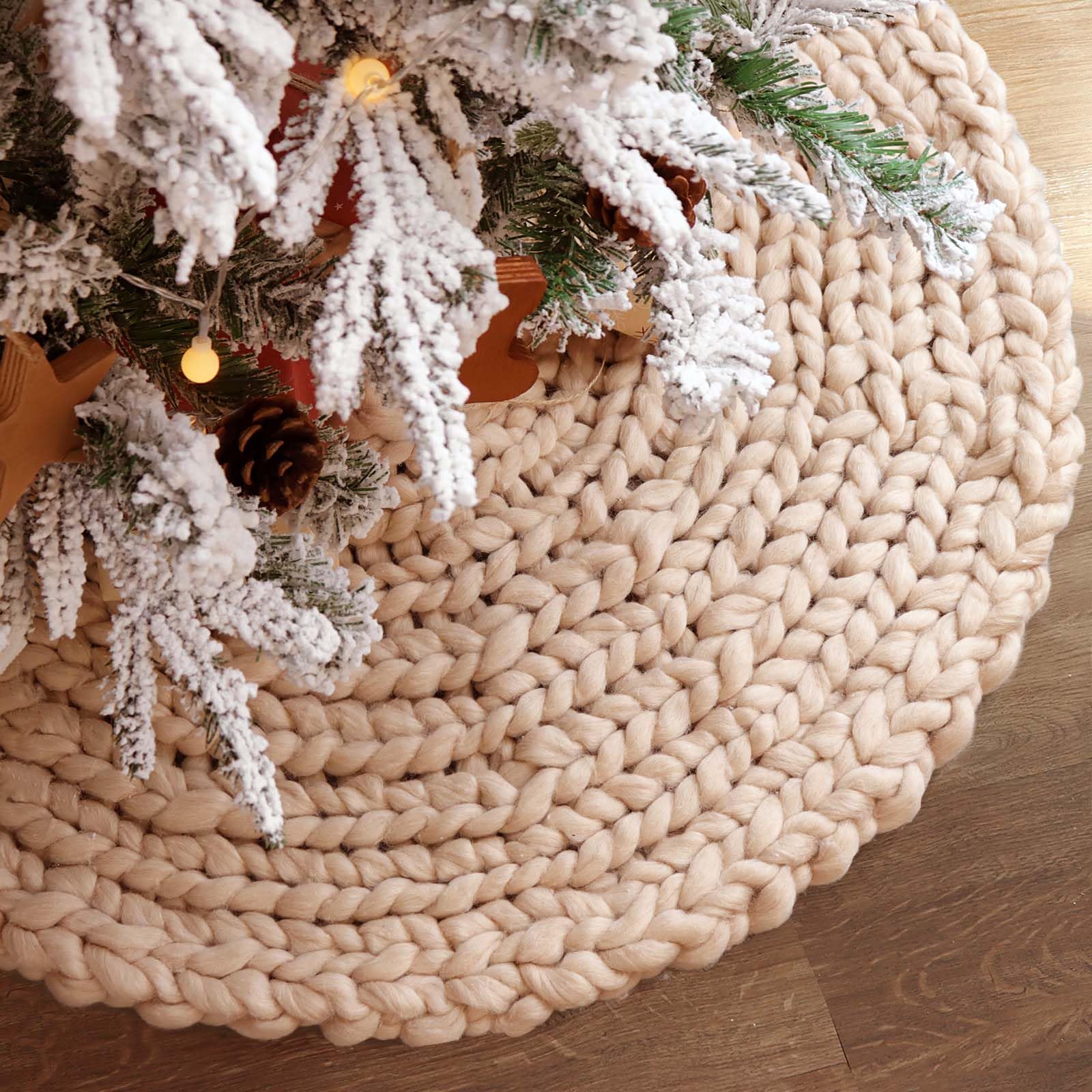Close view of chunky skirt texture below flocked branches