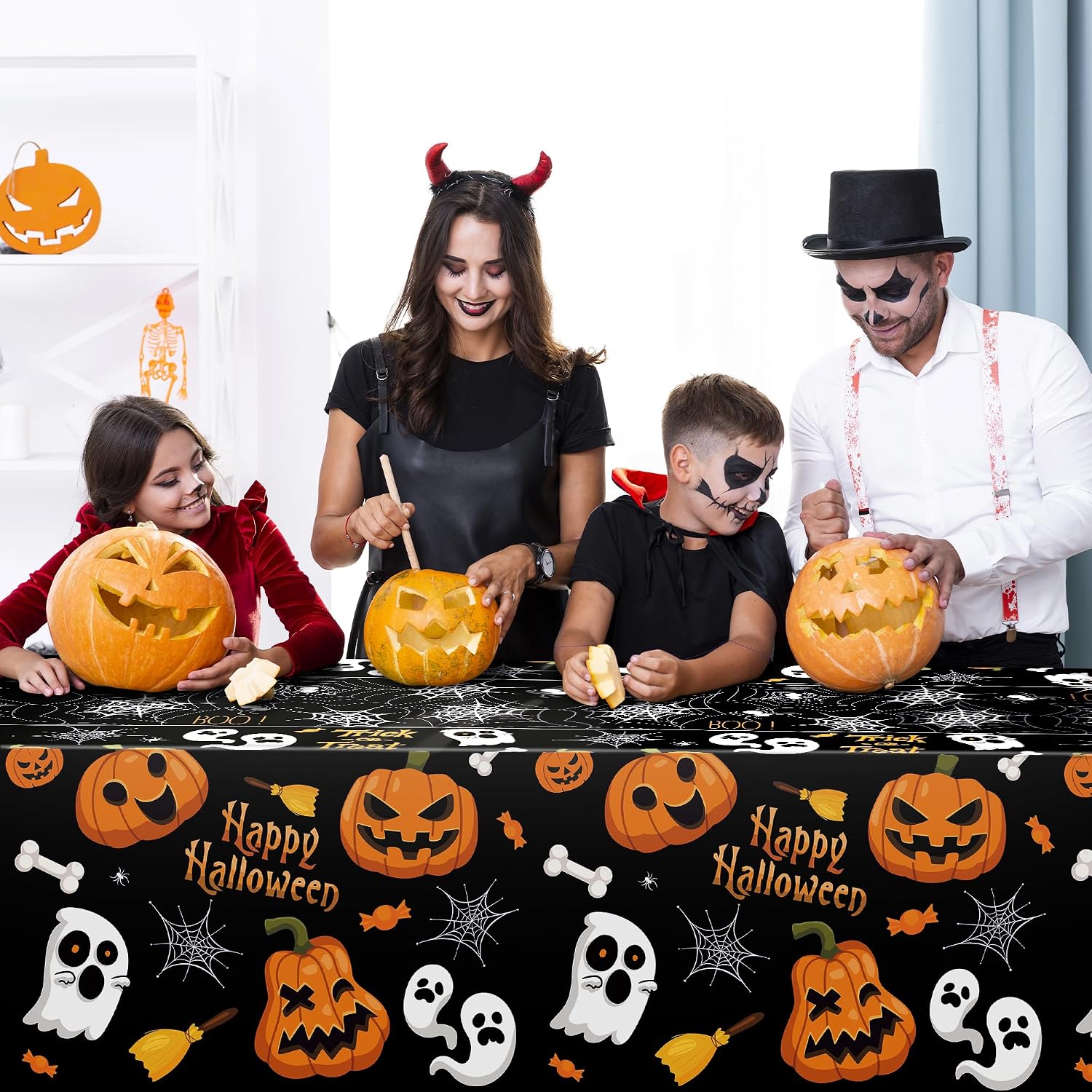 Black cloth in a promotional pumpkin-carving scene
