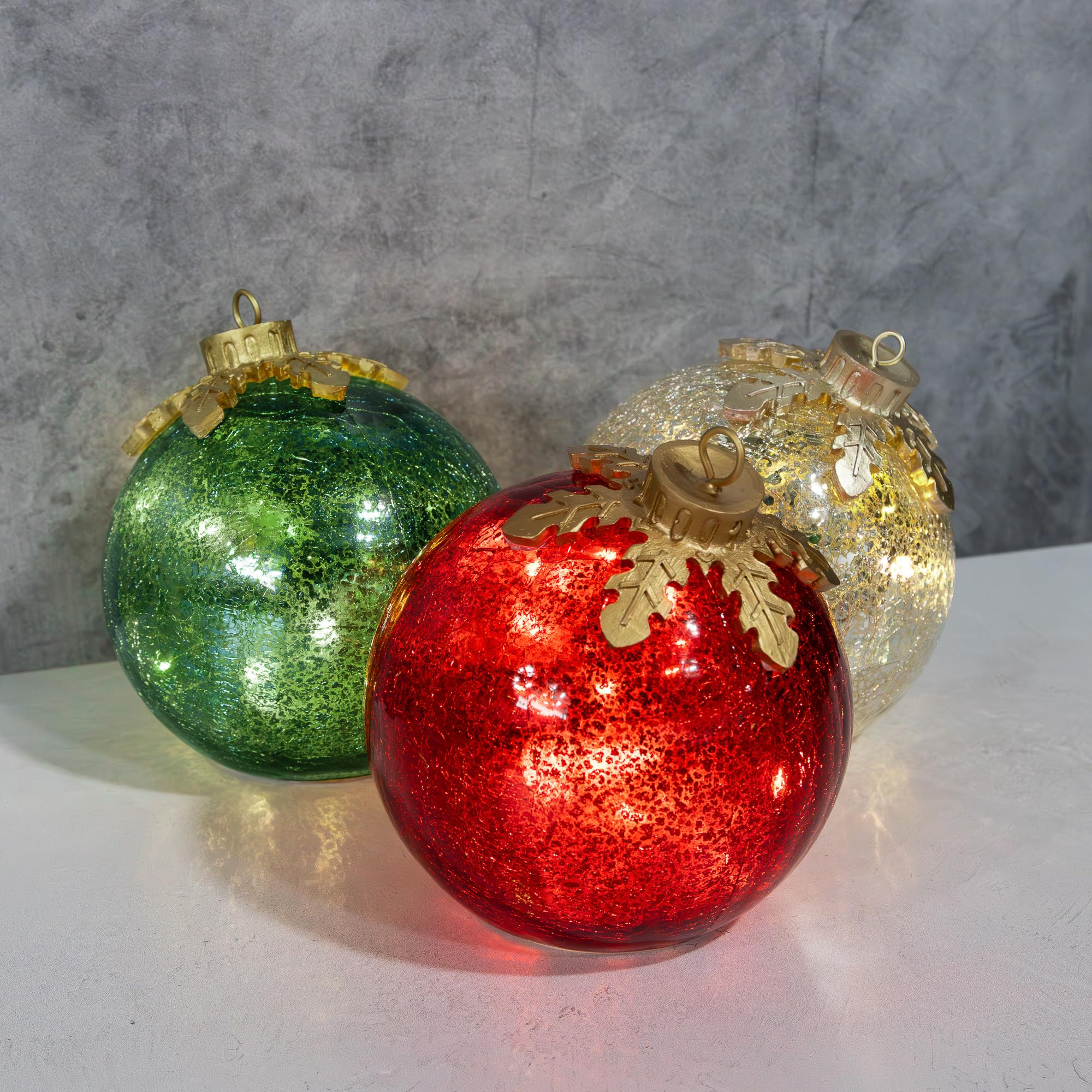 Close styled arrangement with red globe in front and warm-white lights