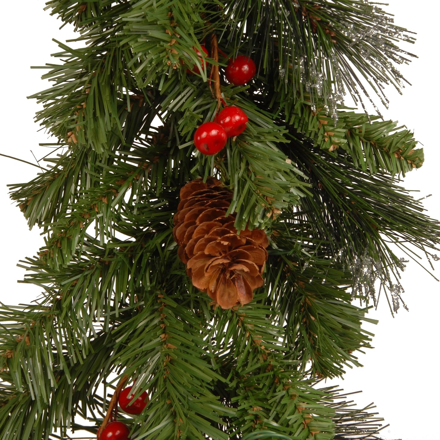Close-up of Crestwood foliage, red berries and pinecones