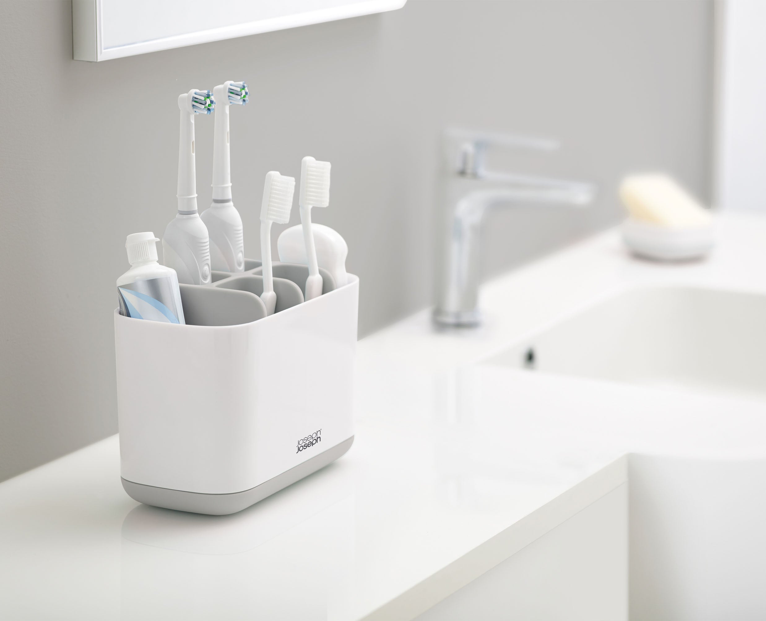 Joseph Joseph 70510 caddy placed beside a bathroom basin