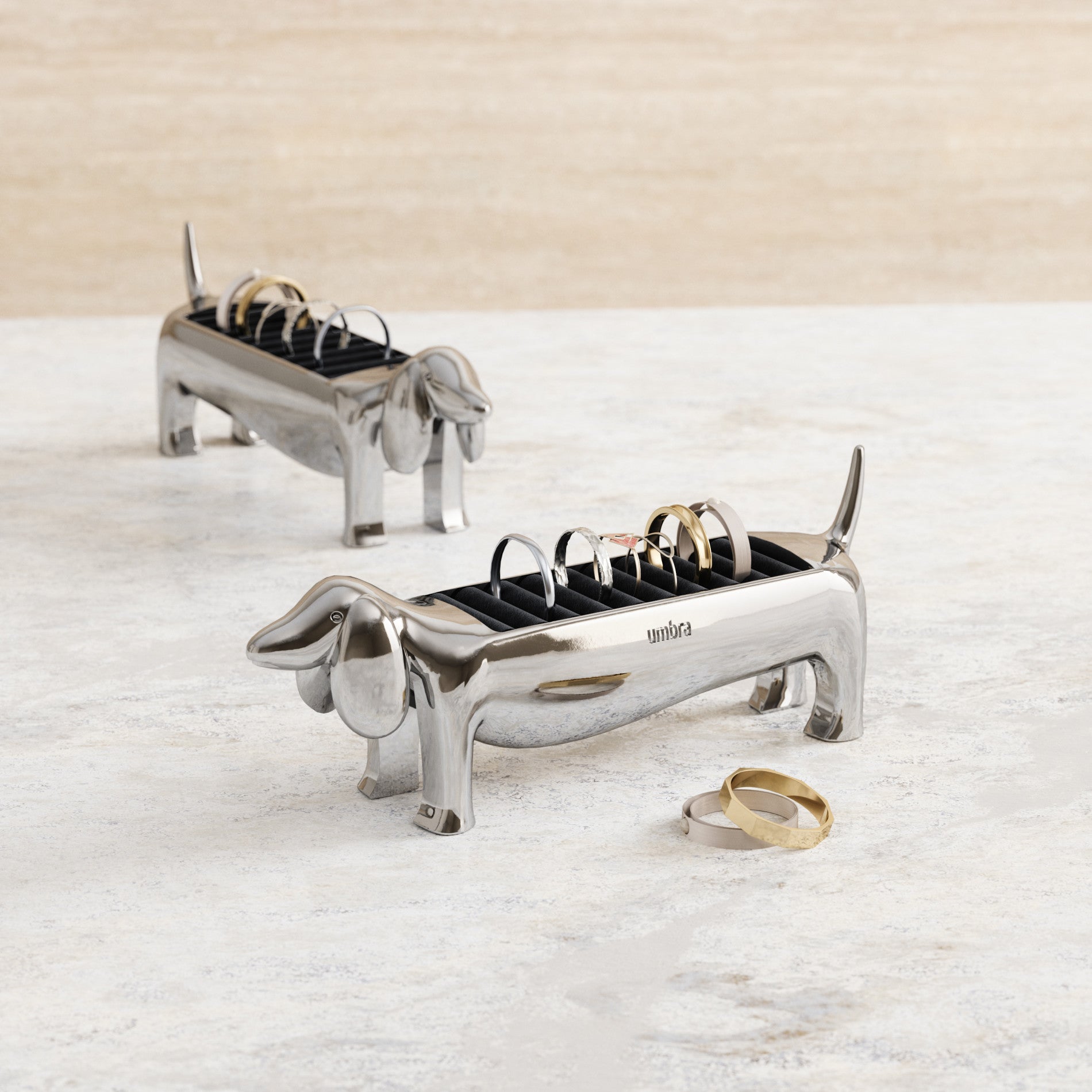 Two Chrome Umbra Dachsie ring holders shown in the supplier gallery