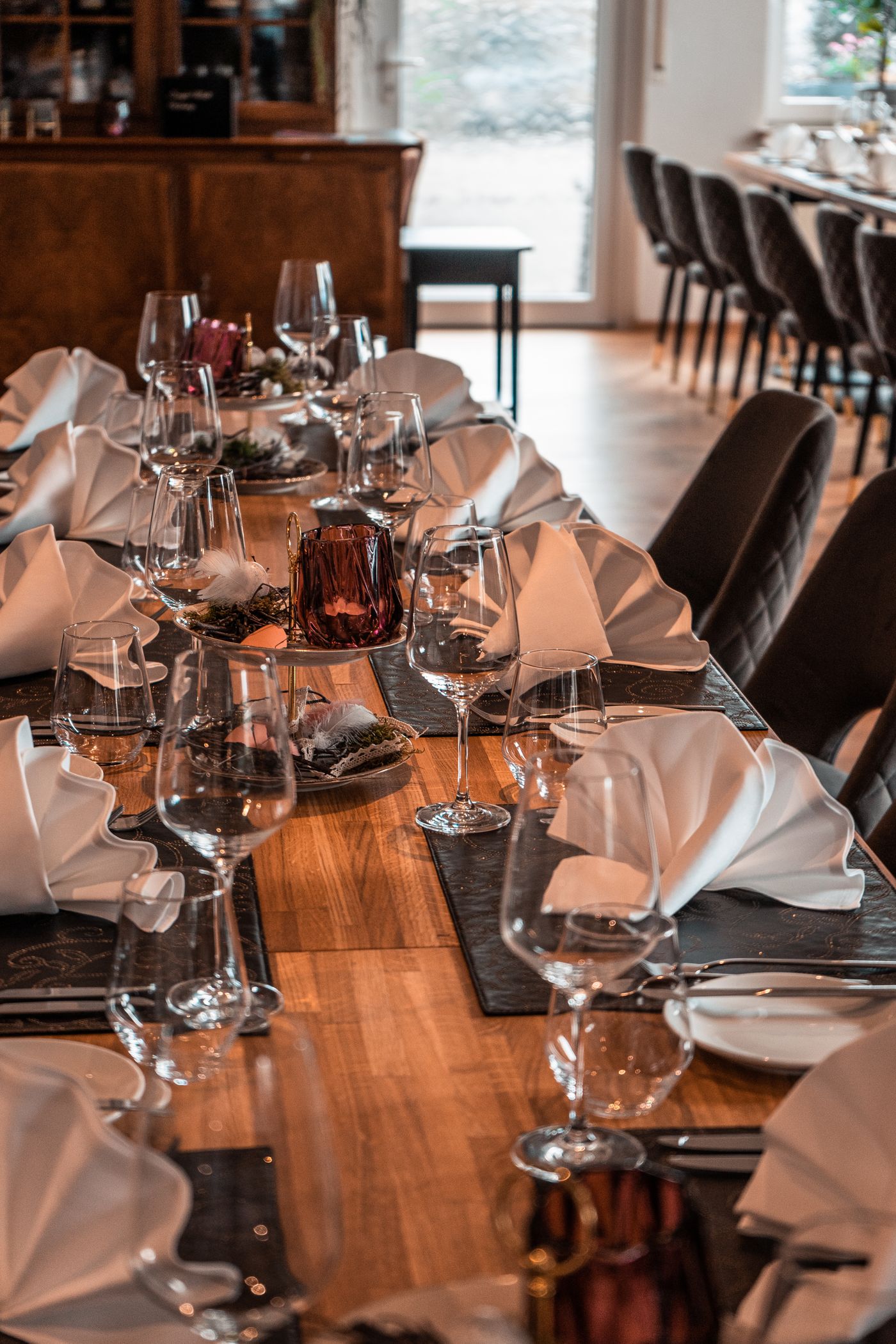 A longer table arranged with separate guest places