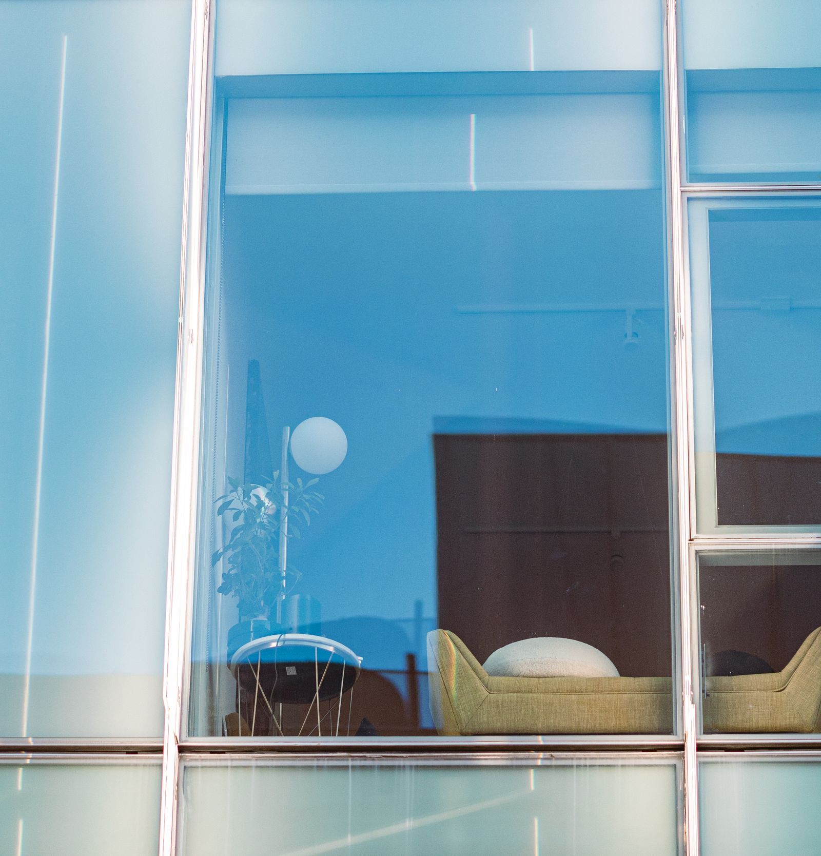 Large apartment glass windows viewed from outside