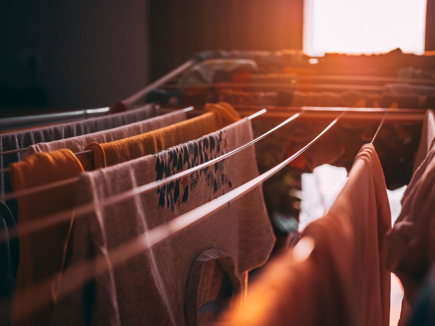 Clothes drying along several rack rails