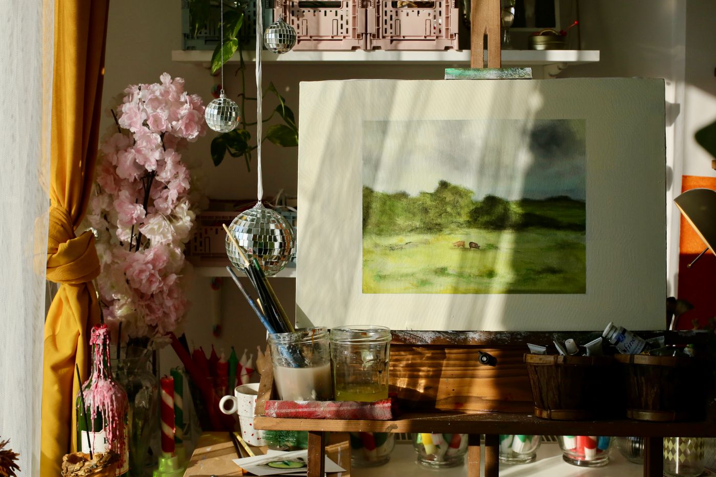 Artist corner with an easel and painting supplies
