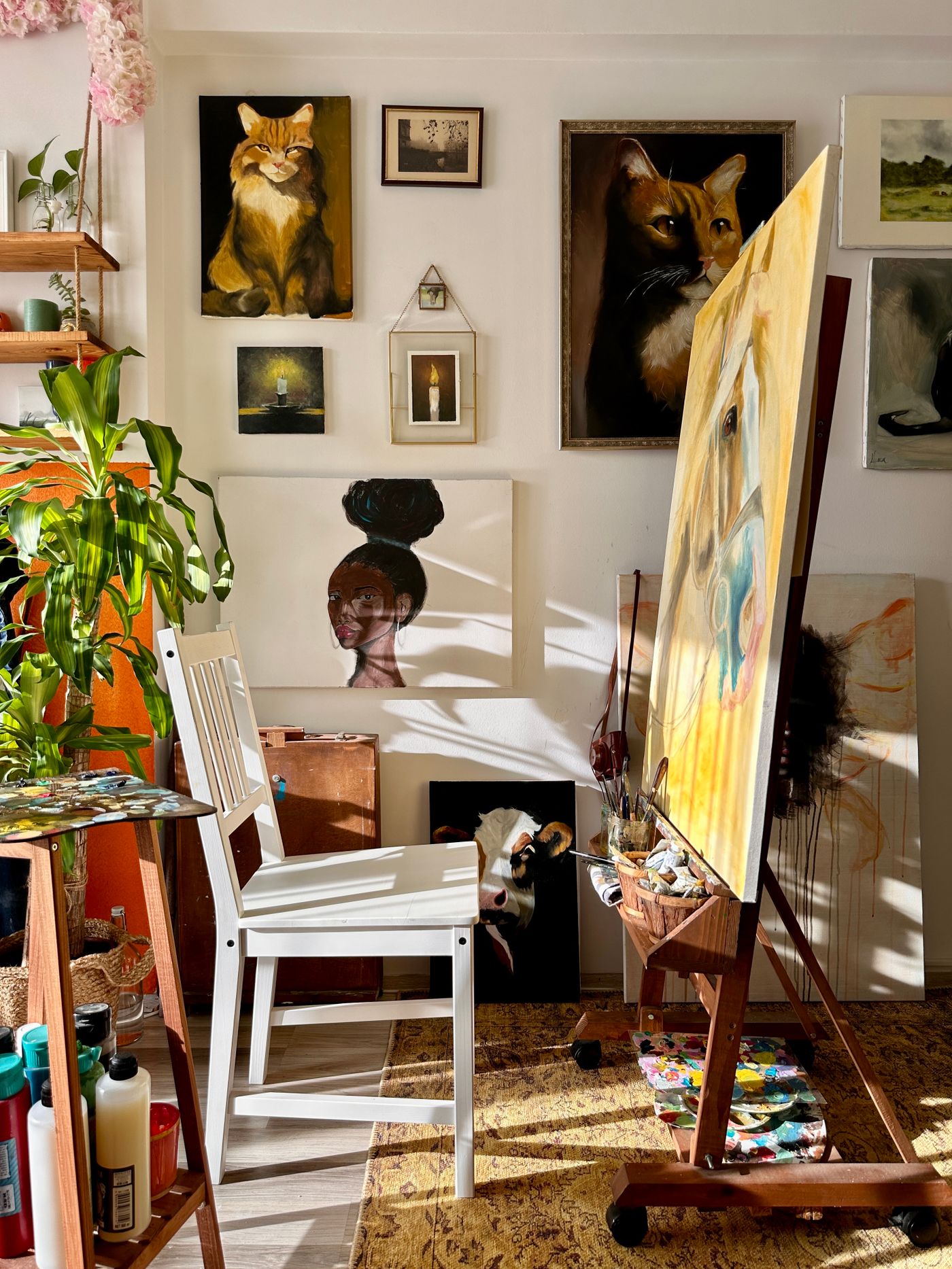 Painting workspace with easel and surrounding furnishings