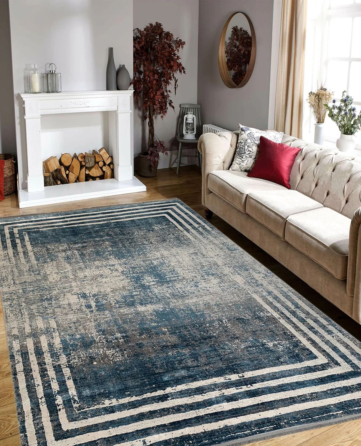 Blue patterned rug and smaller patterned cushions in a bright living room