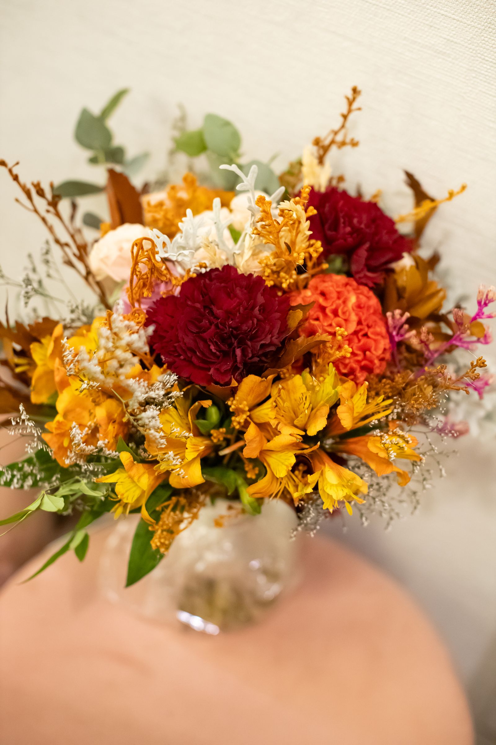 Autumn flowers in red, orange, and yellow