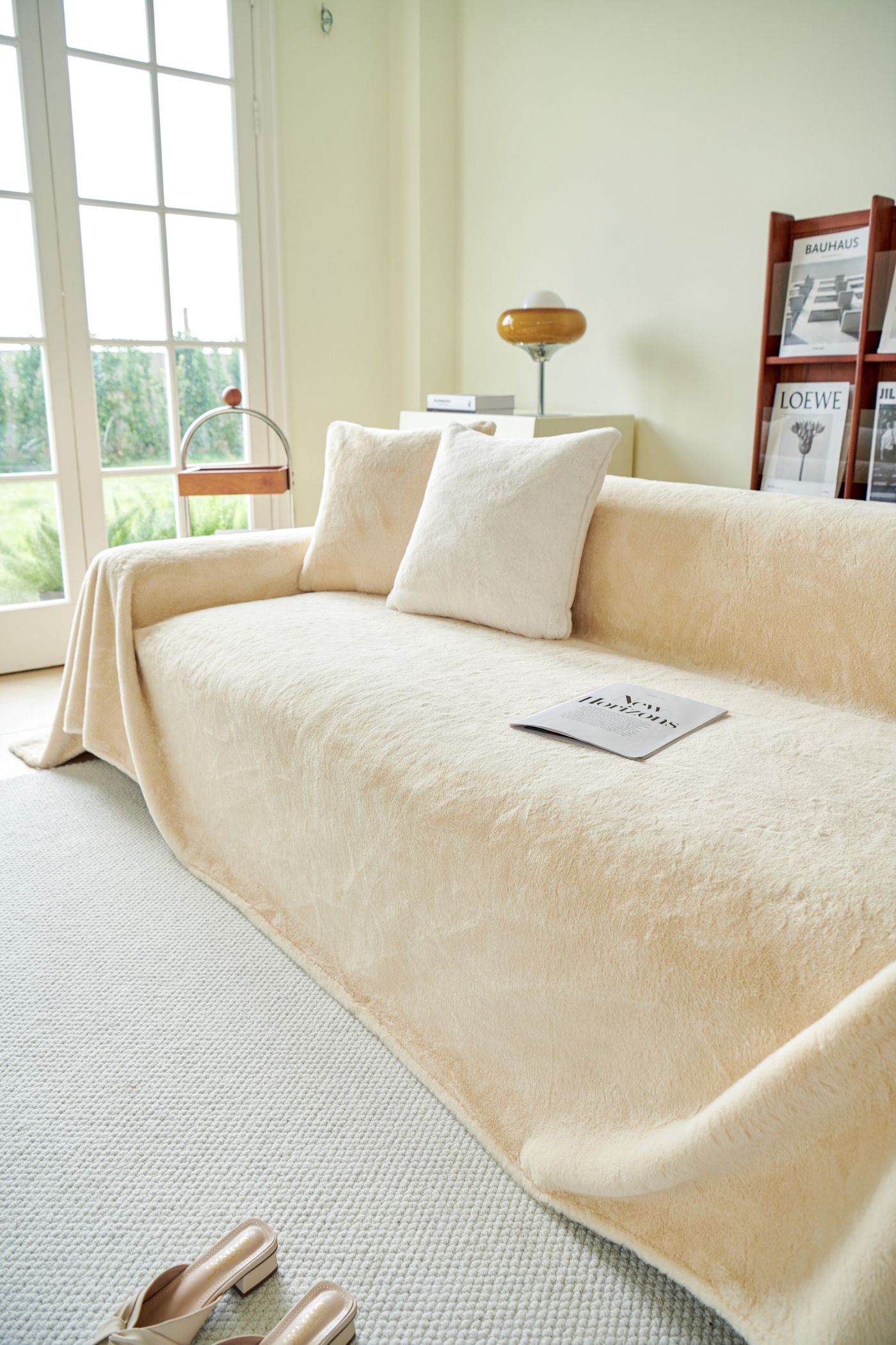 Cream sofa-cover fabric over the seat and arm